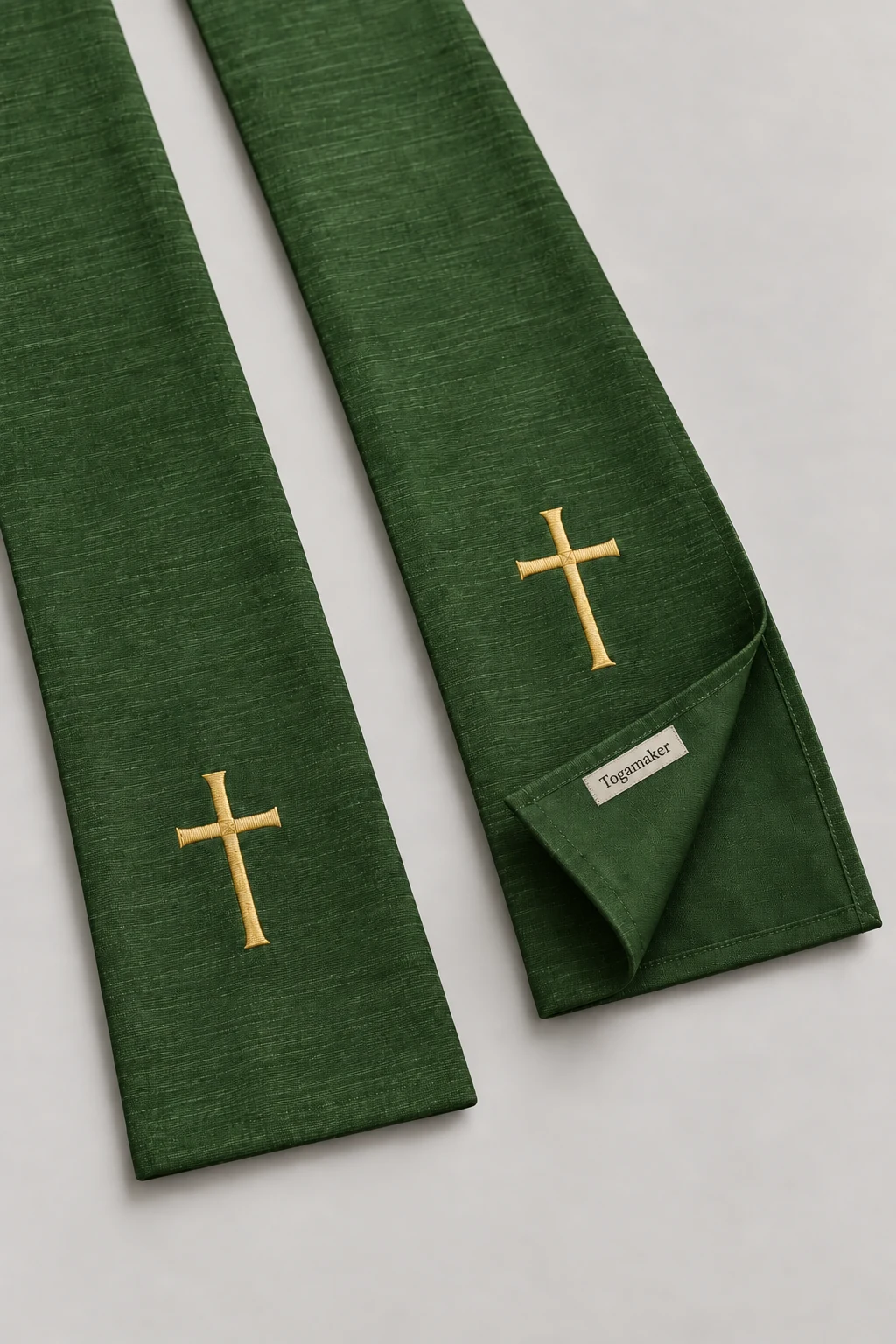 Borduursel en stofdetail van de groene stola
